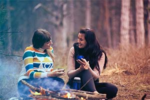 Couple camping outdoors