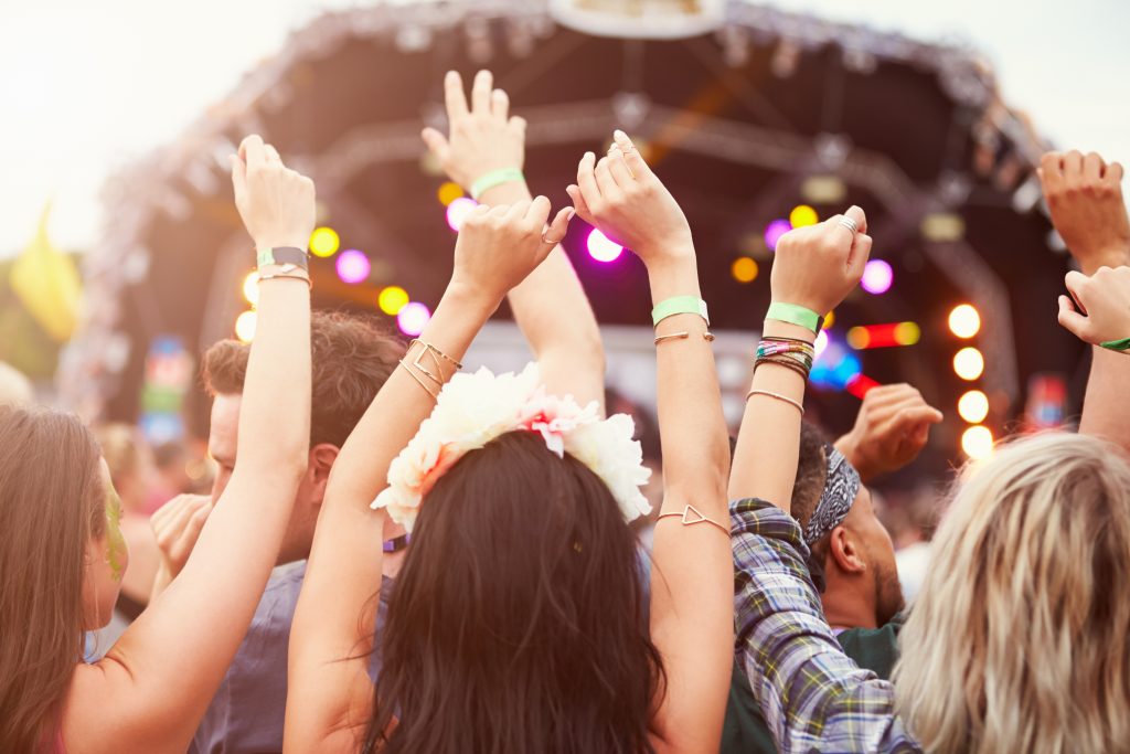 hands raising at concert