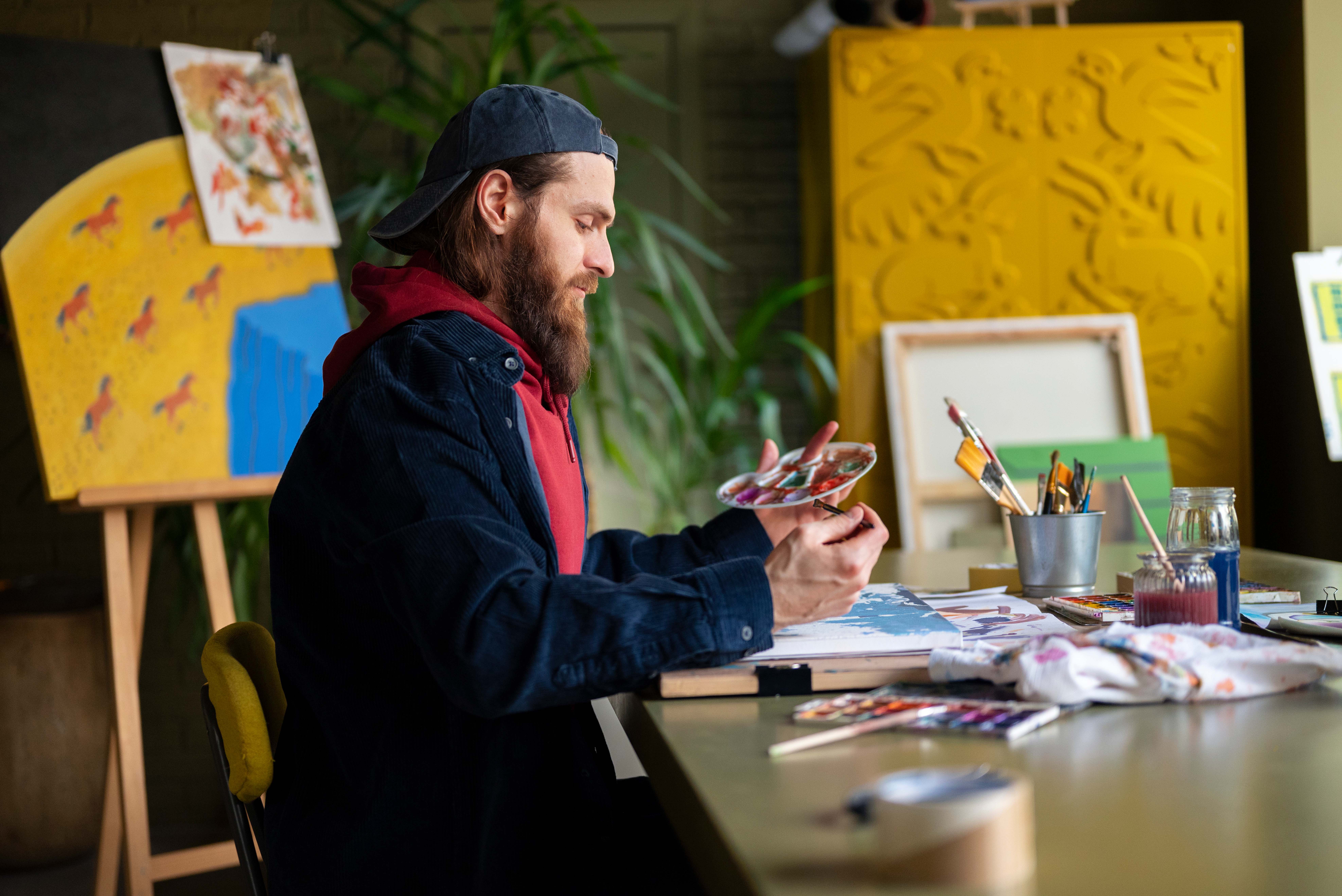Veteran creating art in a studio