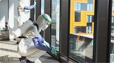 People in safety gear removing lead.