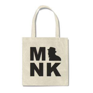 A tote bag with the word monk on it. There is a silohouette of Monk instead of the letter ). 