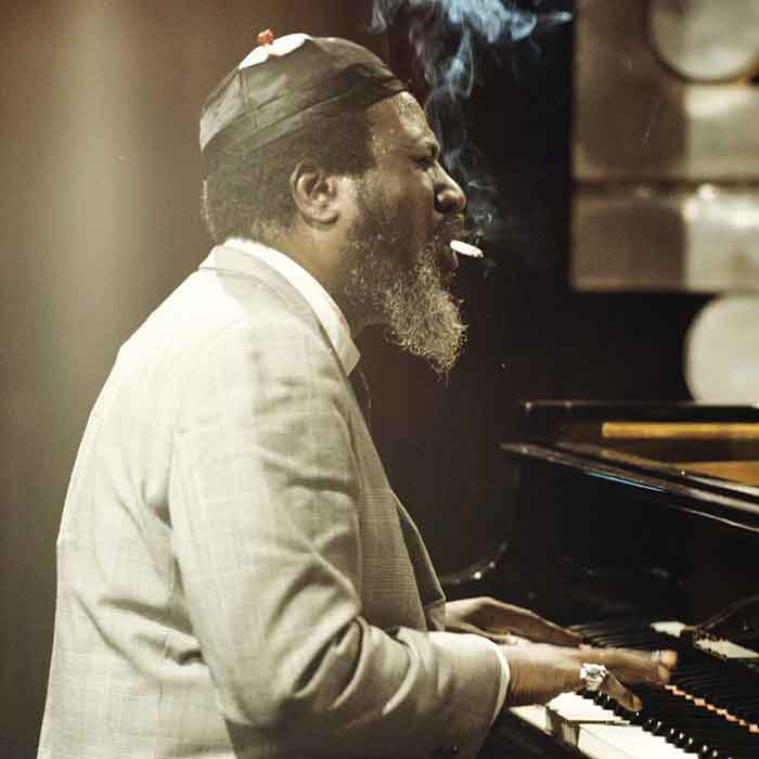 Theloniouos Monk smoking and playing piano